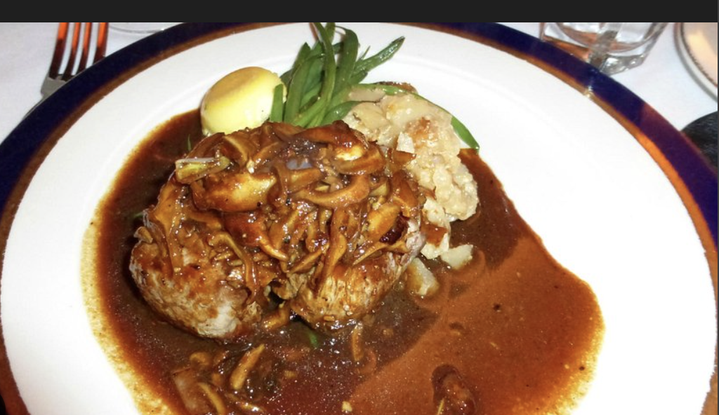 Johnny’s Bar on Fulton signature dishes Veal "Johnny's" (with mushrooms and artichokes)Johnny's Strip SteakLinguine with Clam Sauce